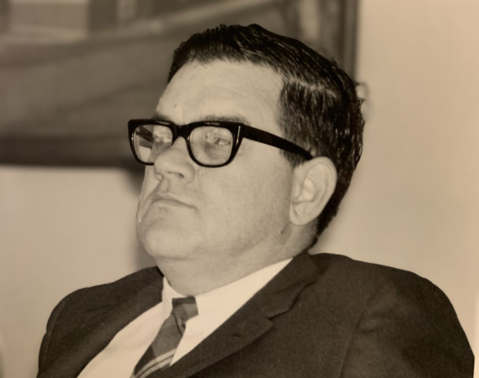 Doug Mowat head and shoulders shot of Doug Mowat in suit and tie looking left of the camera