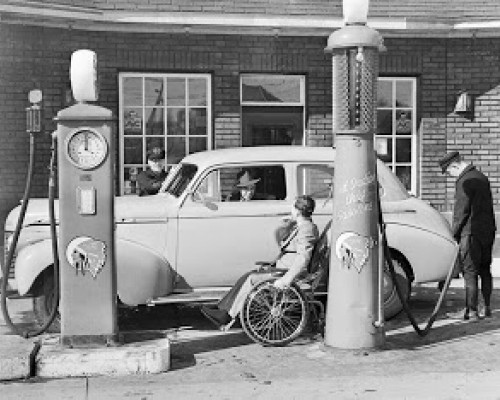 Jimmy Darou pumps gas at his station