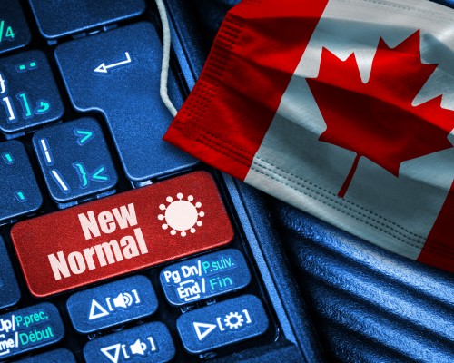 Keyboard with "new normal" button in Canada's red and white